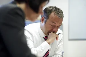 Mann mit Stift